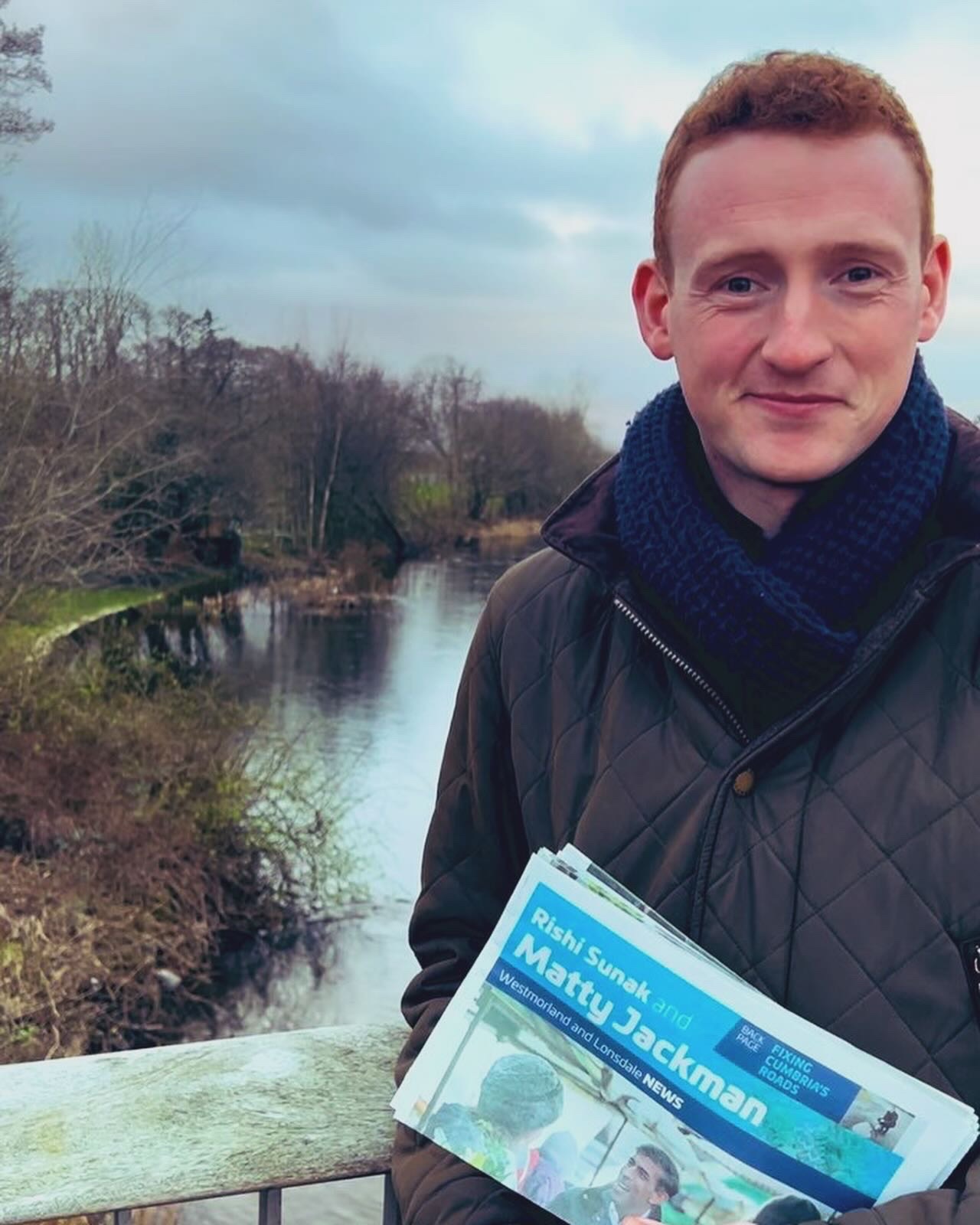 Matty holding leaflet